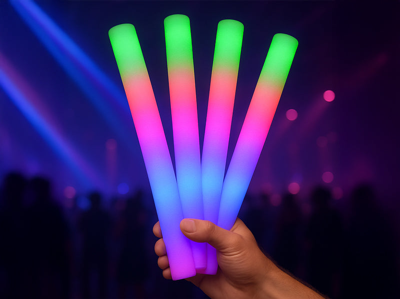Multi-color LED foam sticks glowing in nightclub lighting for parties and bottle service celebrations