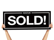 realtor sold sign