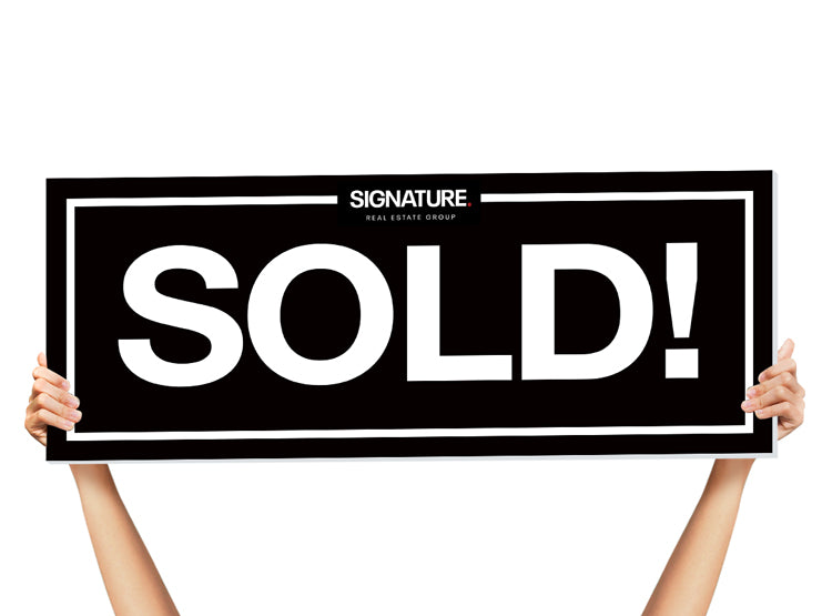 realtor sold sign